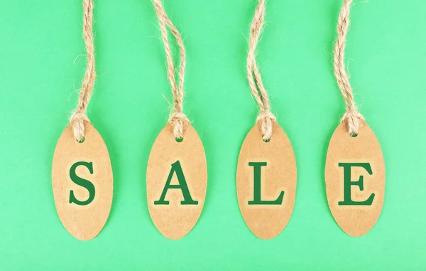 Sale tags on green background — Stock Photo, Image