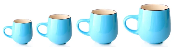 Concept Evolution. Tasses bleues isolées sur blanc — Photo