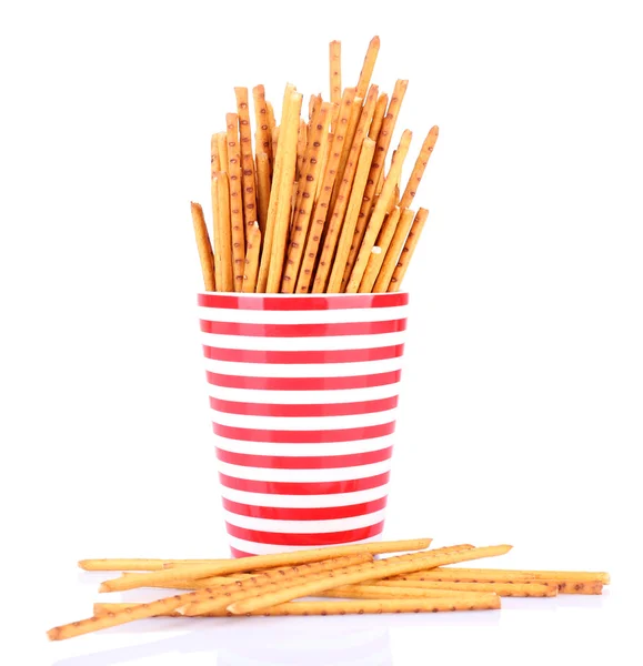 Sticks in red cups on white background isolated — Stock Photo, Image