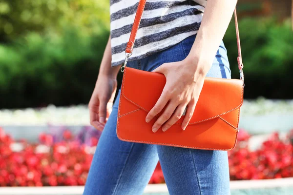 Girl with bag over shoulder — Stock Photo, Image