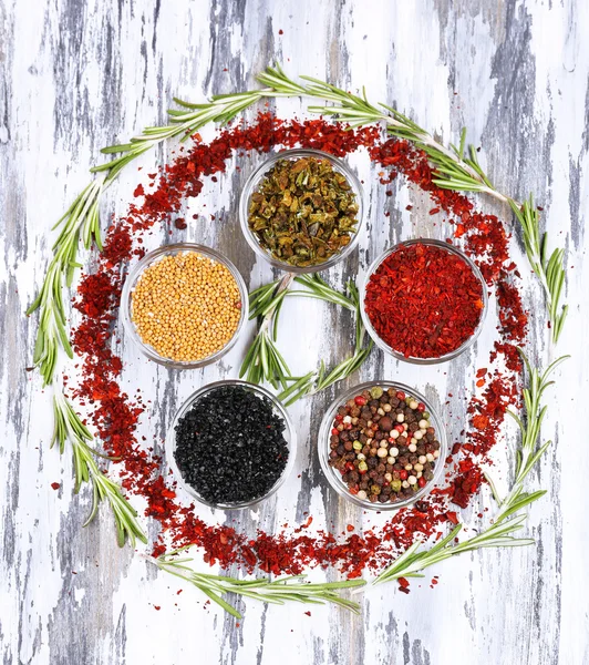 Spices with herbs on wooden background — Stock Photo, Image