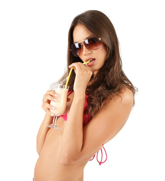 Beautiful young woman in swimsuit with cocktail isolated on white — Stock Photo, Image