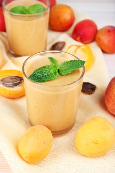 Apricot dessert in glasses on table close-up — Stock Photo, Image