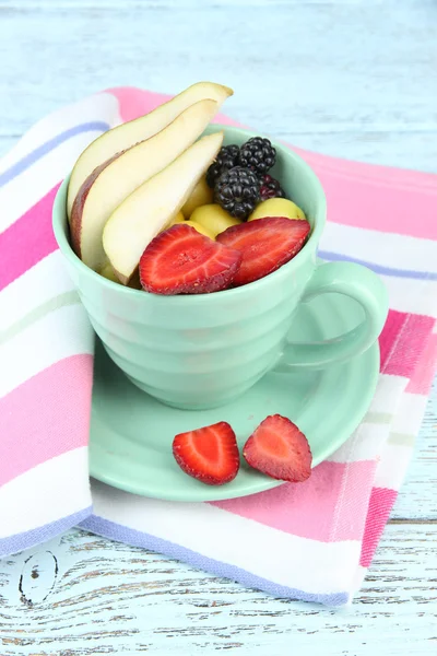 Fresh tasty fruit salad on table — Stock Photo, Image