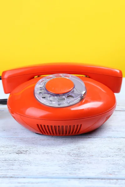 Retro red telephone on color background, close up — Stock Photo, Image