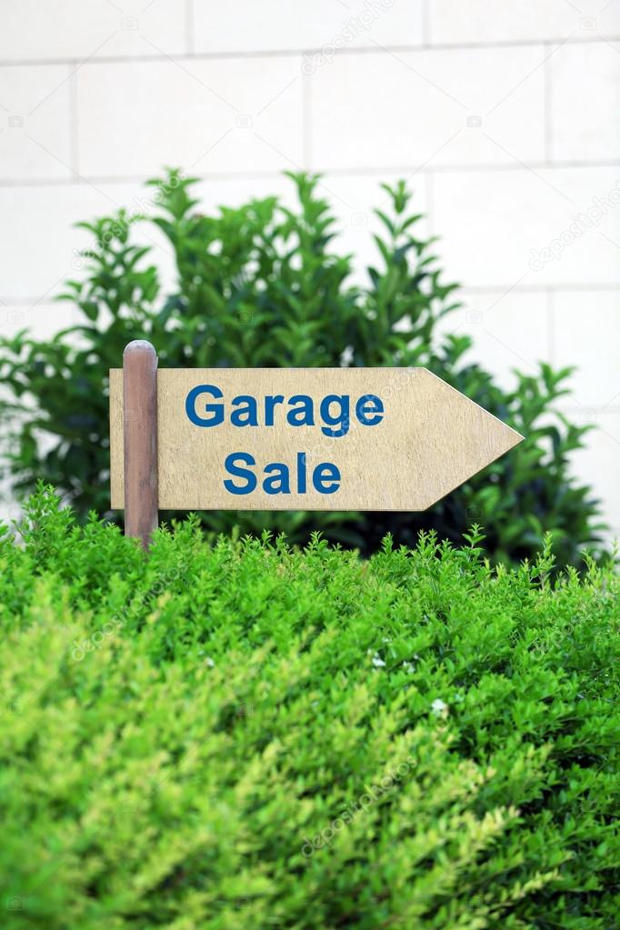 Garage sale sign at park