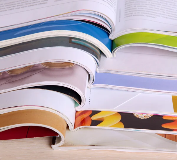 Magazines on wooden table close up — Stock Photo, Image