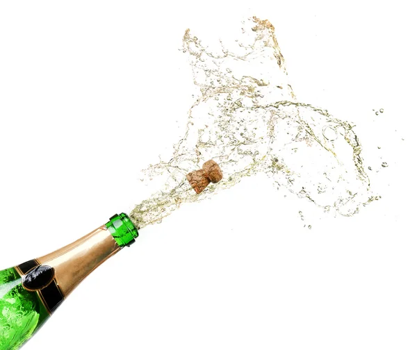 Champagner spritzt vereinzelt auf Weiß — Stockfoto