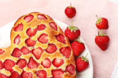 Tasty strawberry pie on table clipart