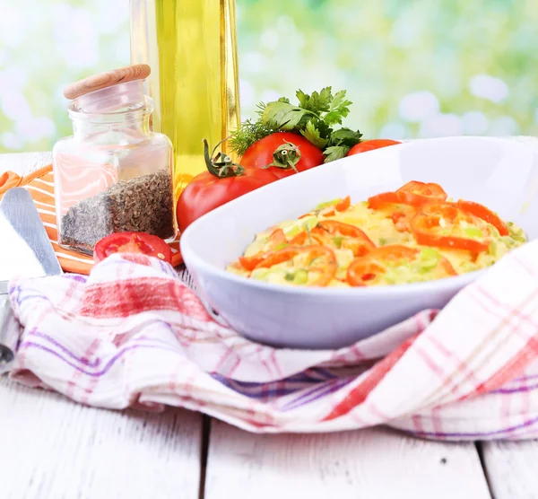 Casserole with vegetables in bowl  on natural background — Stock Photo, Image