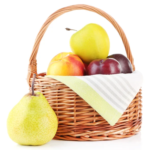 Assortment of juicy fruits in wicker basket, isolated on white — Stock Photo, Image