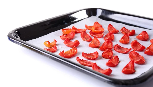 Sušenými rajčaty na sušení zásobník, izolované na bílém — Stock fotografie