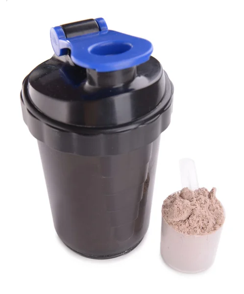 Whey protein powder in scoop and plastic shaker isolated on white — Stock Photo, Image