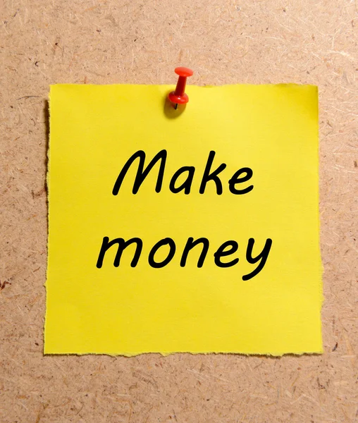 Paper sheet with inscription "Make money" on wooden background — Stock Photo, Image