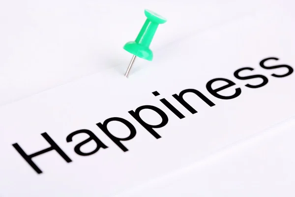 Push pin on paper with word happiness written on it isolated on white — Stock Photo, Image