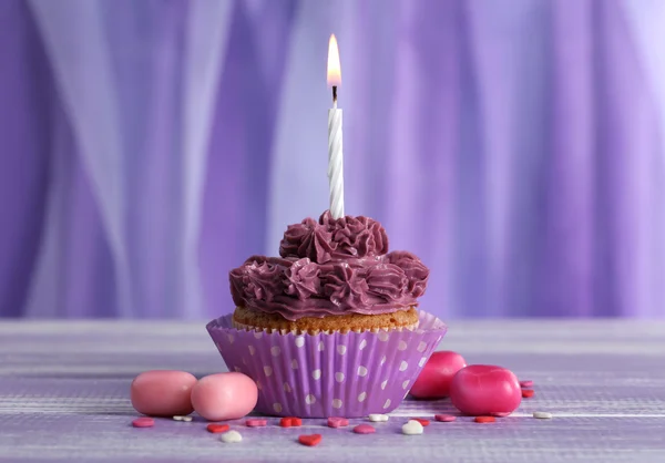 Tasty cupcake on table, close up — Stock Photo, Image