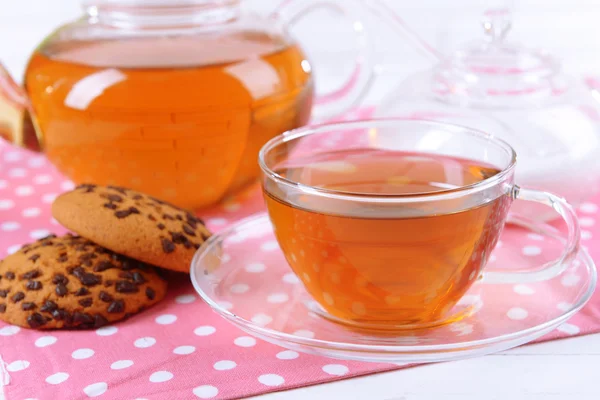 Teapot and cup of tea on table close-up — Stock Photo, Image