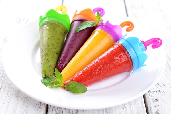 Delicious ice cream on plate on table close-up — Stock Photo, Image