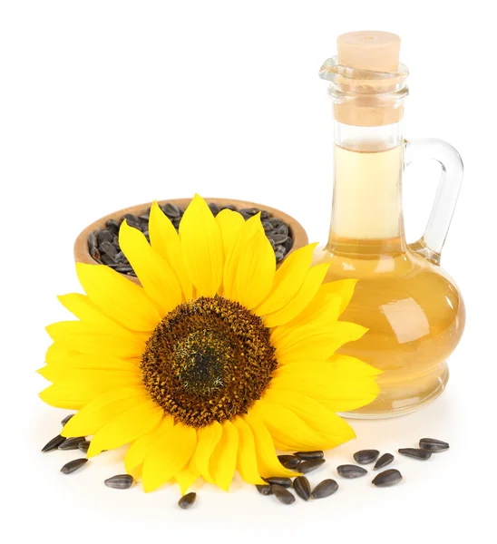 Sunflower with seeds and oil isolated on white — Stock Photo, Image