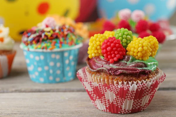 Delicious birthday cupcakes on table close-up — Stock Photo, Image