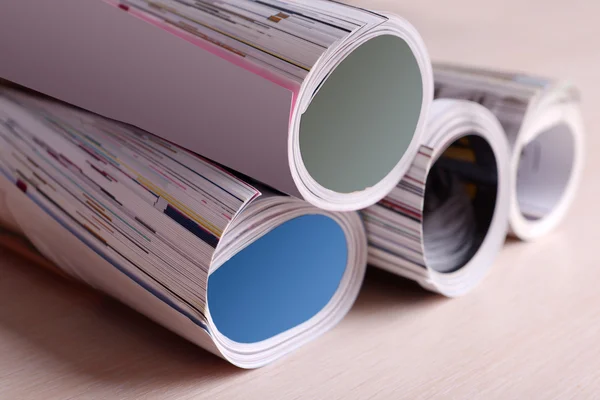 Magazines on wooden table close up — Stock Photo, Image