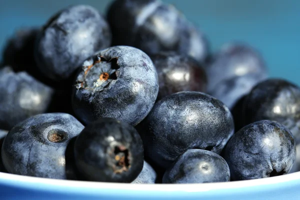 Schmackhafte reife Blaubeeren, auf Holzgrund — Stockfoto