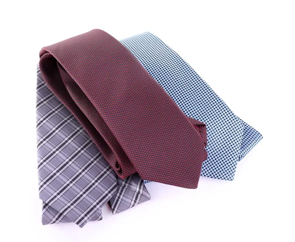 Brown, blue and grey ties on white background isolated — Stock Photo, Image