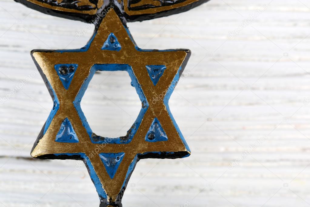 Star of David on wooden background
