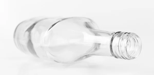 Empty glass bottle isolated on white — Stock Photo, Image