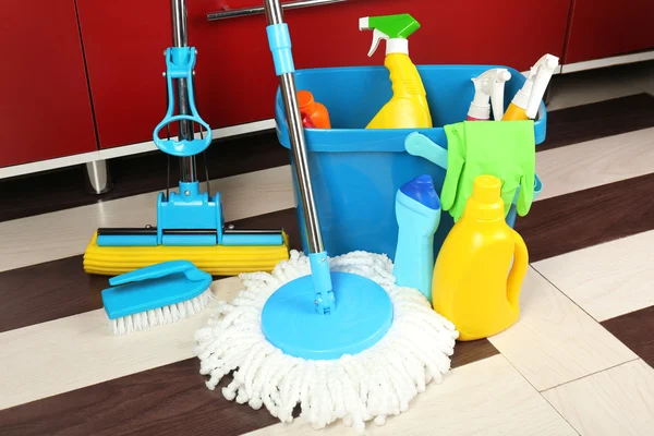 Different tools for cleaning in kitchen — Stock Photo, Image