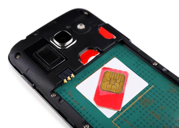 SIM-kaart en slimme telefoon geïsoleerd op wit — Stockfoto