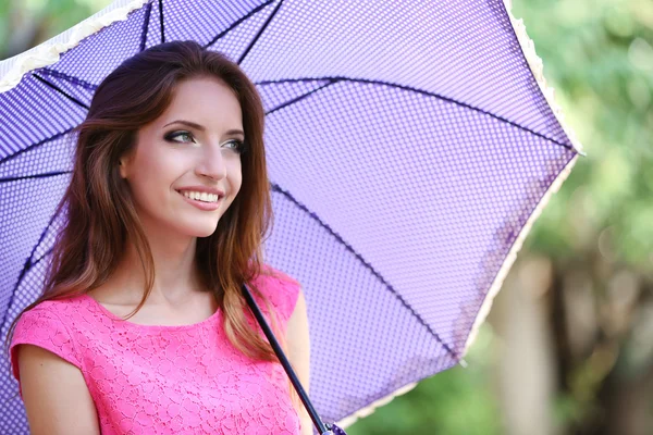 Beautiful young girl with umbrella — Stock Photo, Image