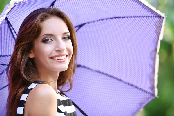 Beautiful young girl with umbrella — Stock Photo, Image