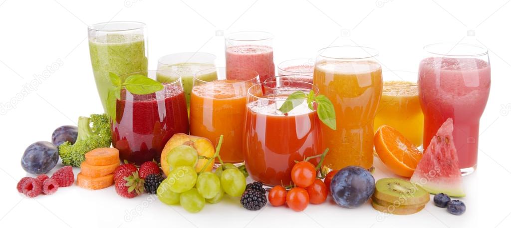 Glasses of tasty fresh juice, isolated on white