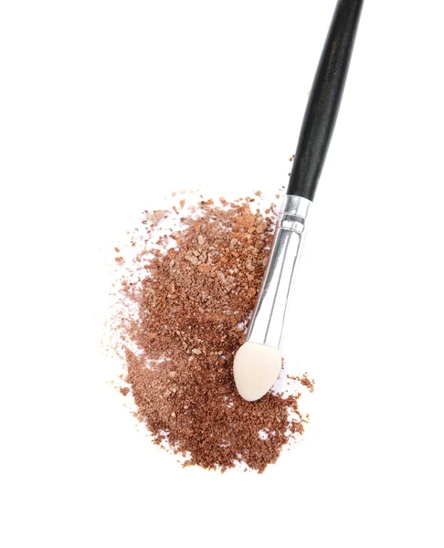 Crushed eyeshadow and professional make-up brush isolated on white — Stock Photo, Image