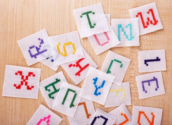 Handmade embroidered letters — Stock Photo, Image