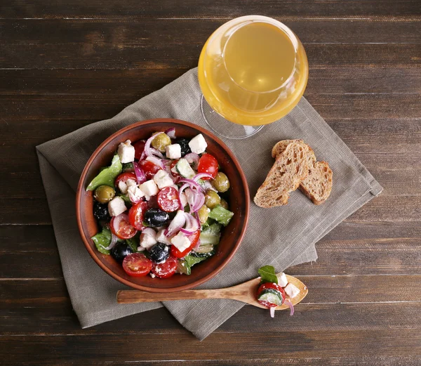 Greek salad served in brown bowl — Stock Photo, Image