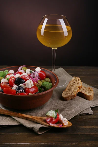 Greek salad served in brown bowl — Stock Photo, Image