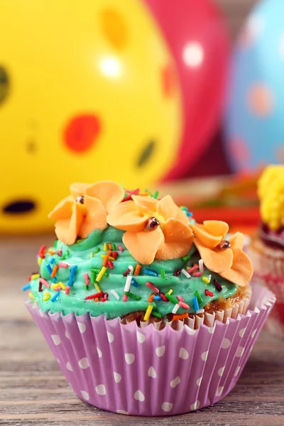 Delicious birthday cupcakes on table close-up — Stock Photo, Image