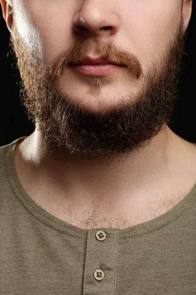 Closeup of long beard and mustache man on dark background — Stock Photo, Image