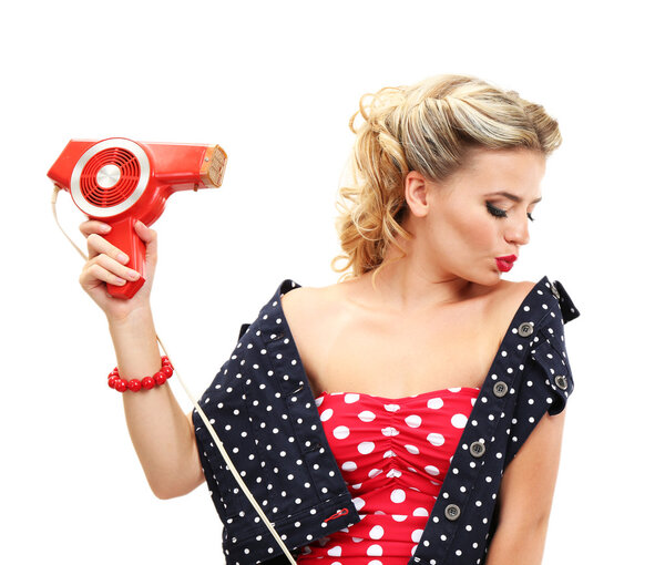 Beautiful girl with hairdryer