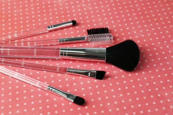 Brushes for makeup on pink background — Stock Photo, Image