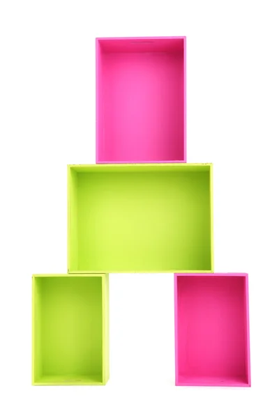 Caixas de madeira multicoloridas isoladas a branco — Fotografia de Stock