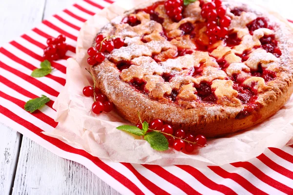 Tasty cake with berries on table close-up — Stock Photo, Image