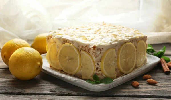 Tasty lemon cake on table at home — Stock Photo, Image