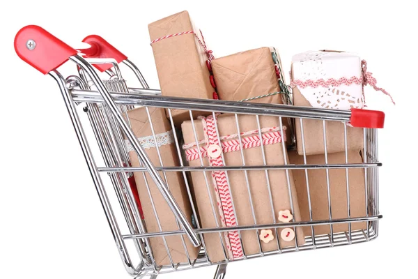 Present boxes in shopping cart — Stock Photo, Image