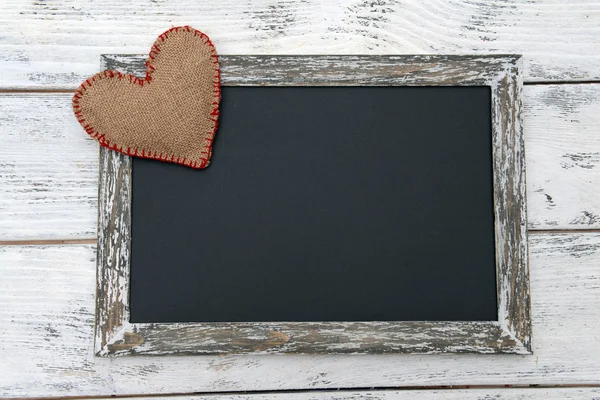 Vintage sign board on wooden background — Stock Photo, Image