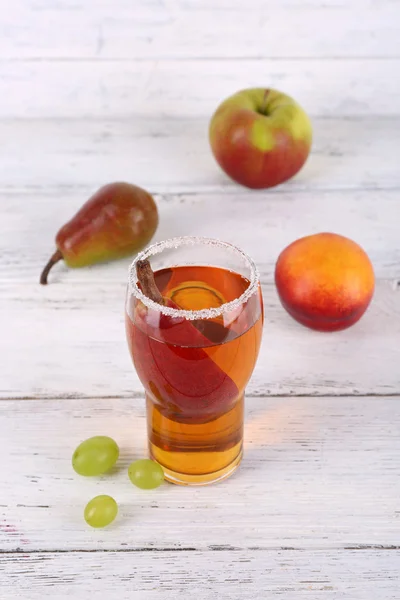 Tasty summer drink with fresh fruits, on wooden table — Stock Photo, Image