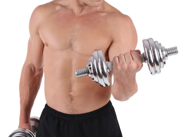 Guapo joven deportista muscular ejecutar ejercicio con mancuernas aisladas en blanco — Foto de Stock