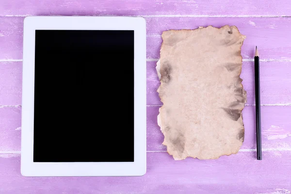 Tablet, piece of paper — Stock Photo, Image